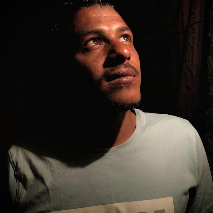 Kaveri Mehta, Lead Design Curator at Cobalt Meadow Lane, reviewing corporate floral arrangements